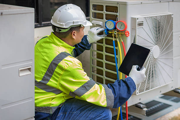 Professional Heat Pump Repair technician working in McCordsville, IN